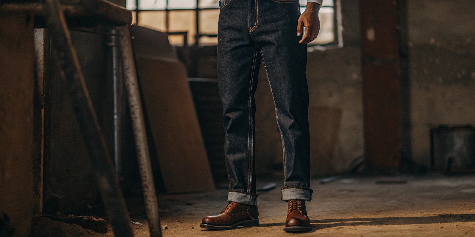 A pair of 25oz jeans standing up on its own without any support, demonstrating its extreme stiffness and weight.