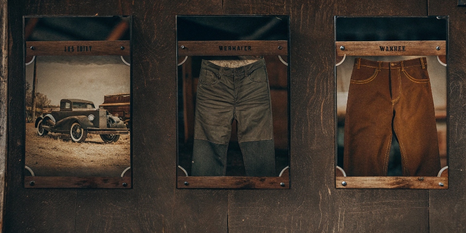 A vintage-style graphic showcasing the classic logos of Levi's, Lee, and Wrangler side-by-side.