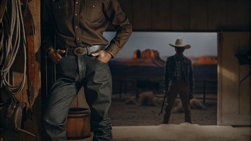An old, black and white advertisement showing a cowboy wearing Lee jeans.