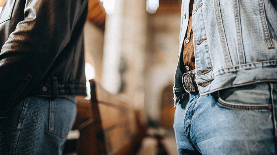 A graphic showing the distinct logos of True Religion and Levi's side-by-side.