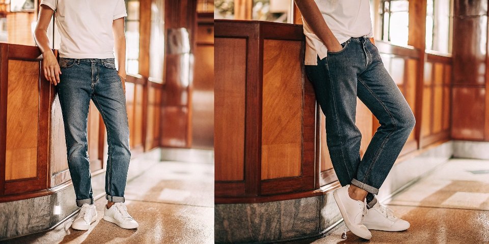A stylish person looking timeless in dark blue jeans, a perfect white t-shirt, and clean white sneakers.