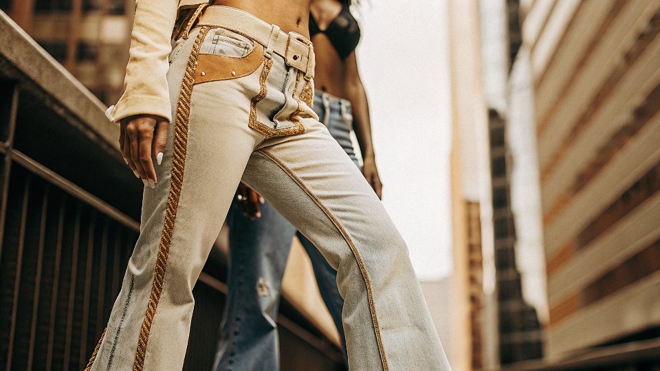 A photo of a celebrity from the 2000s wearing True Religion jeans as a fashion statement.
