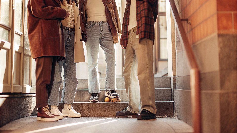 A before-and-after image showing a pair of jeans looking baggy and then perfectly tailored.