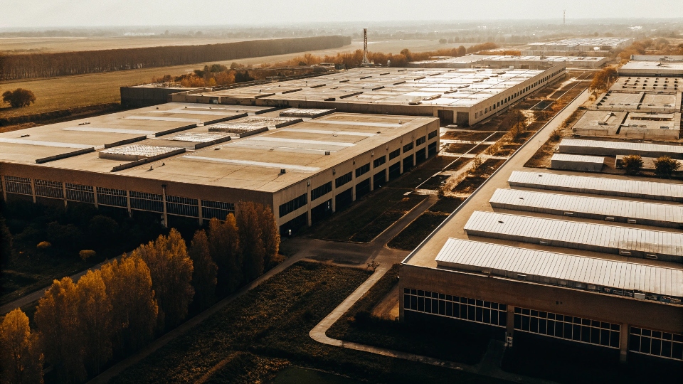 an aerial view of a large, modern denim manufacturing factory