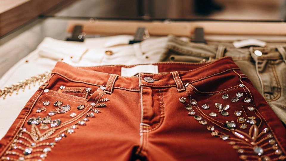 Luxury $10,000 Jeans a pair of designer jeans with jewel embellishments in a luxury store display