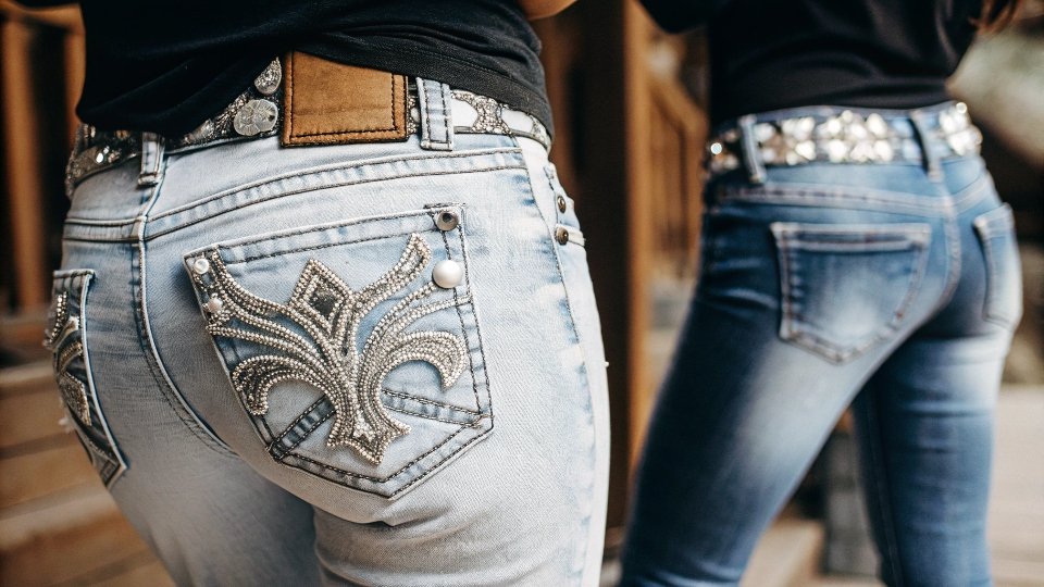 A pair of Miss Me jeans with their signature embellished and stylized back pockets.