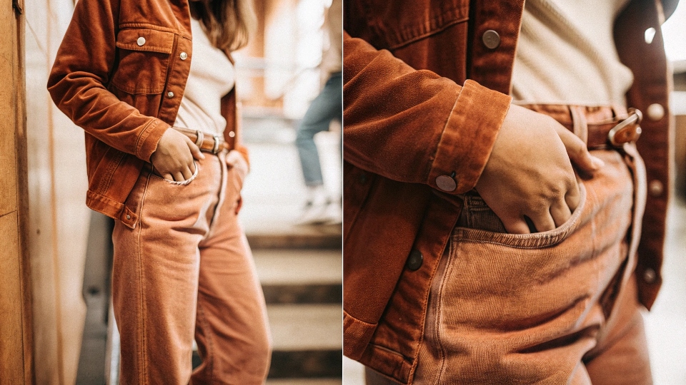 A fashion "don't" example showing a person in a denim jacket and jeans that are too similar in color, looking awkward.