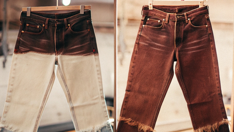 A side-by-side comparison of a new dark jean and a custom-aged vintage-looking jean.
