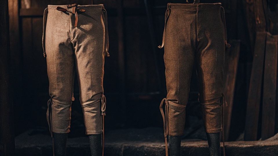 A historical illustration or drawing of medieval trousers, clearly showing two separate leg pieces being worn.