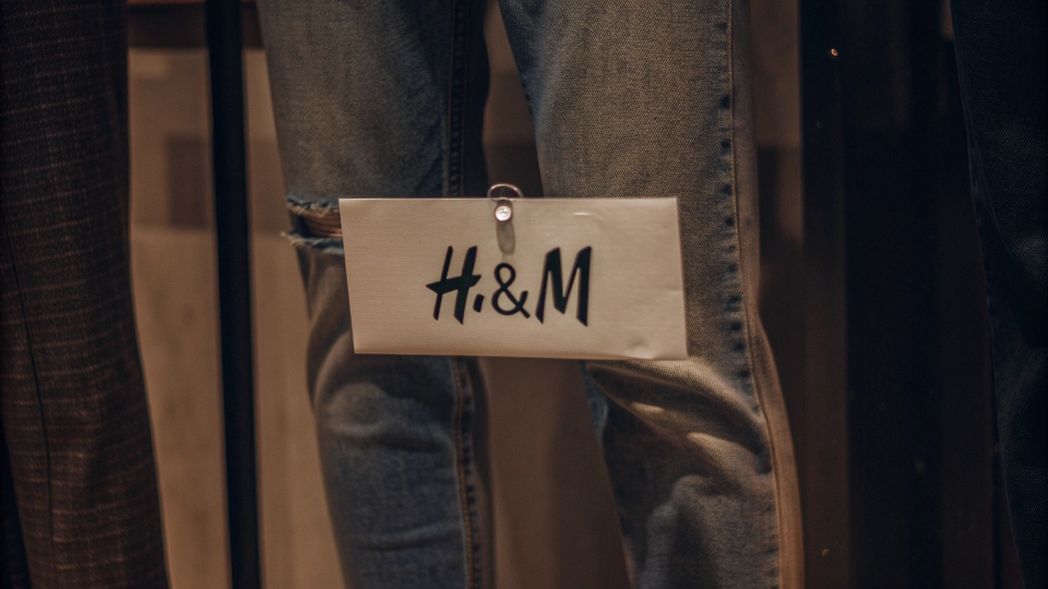 A price tag showing a very low price on a pair of H&M jeans