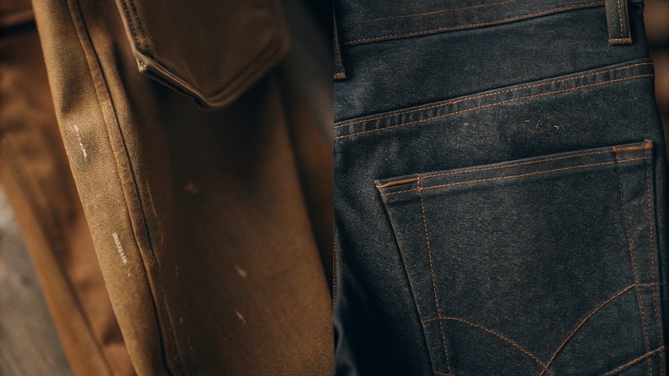 A close-up split-screen image showing the rough texture of denim next to the smooth texture of wool slacks