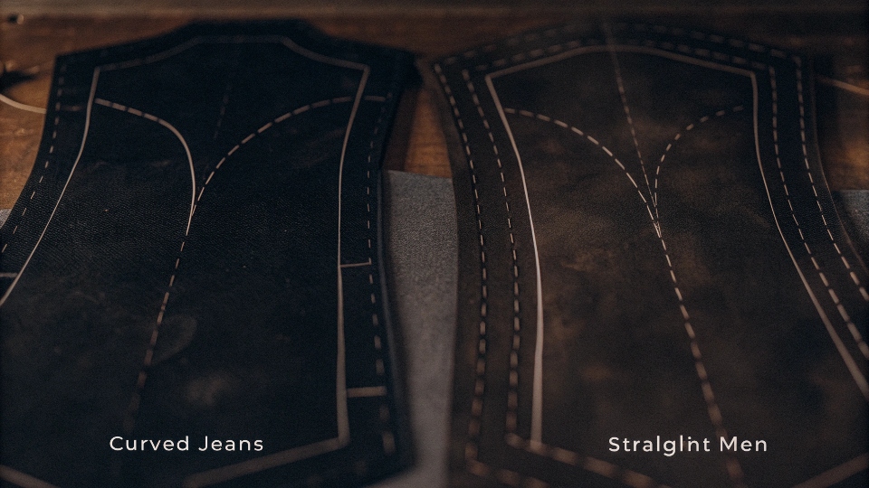 A close-up comparison of a curved jeans pattern for women next to a straight pattern for men