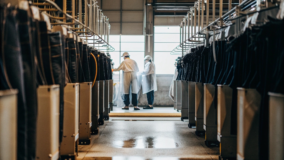 A modern, clean, and high-tech denim finishing facility in Guangzhou, China.