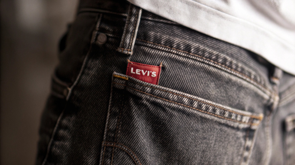 Authentic Levi's Denim Close-up of the iconic Levi's red tab on a jean pocket