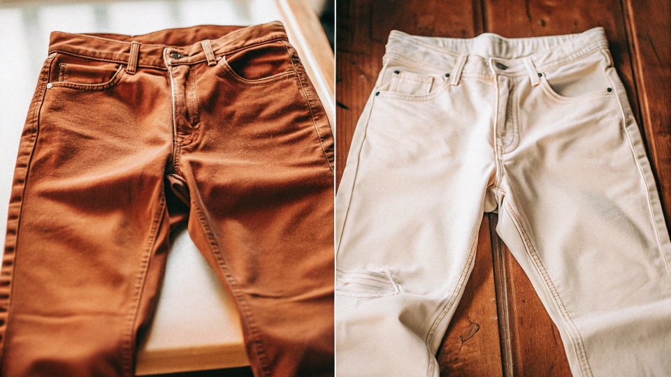 A pair of limp, soft jeans on the left and a crisp, stiff pair on the right