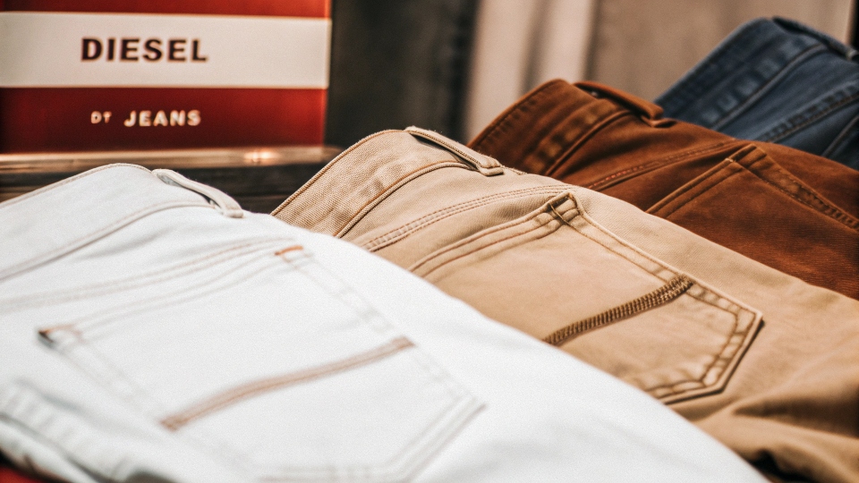 A collection of Diesel jeans showcasing various washes and styles