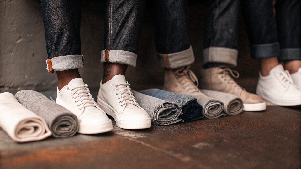 Different Ways to Cuff Jeans Several examples of different jean cuffing styles shown on different shoes