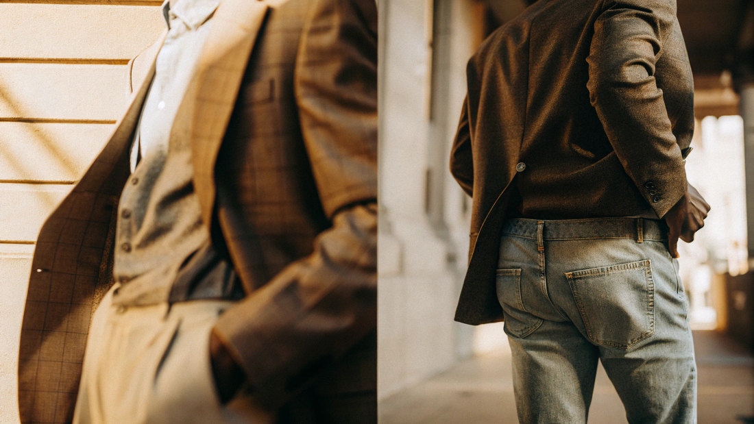 A side-by-side comparison showing the different textures and structures of a formal suit jacket and a casual blazer