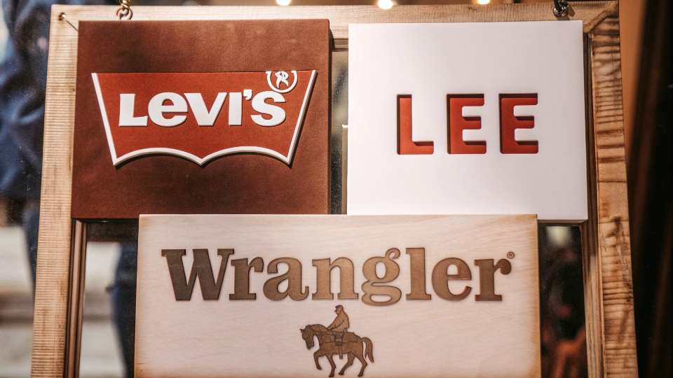 The logos of Levi's, Lee, and Wrangler displayed together
