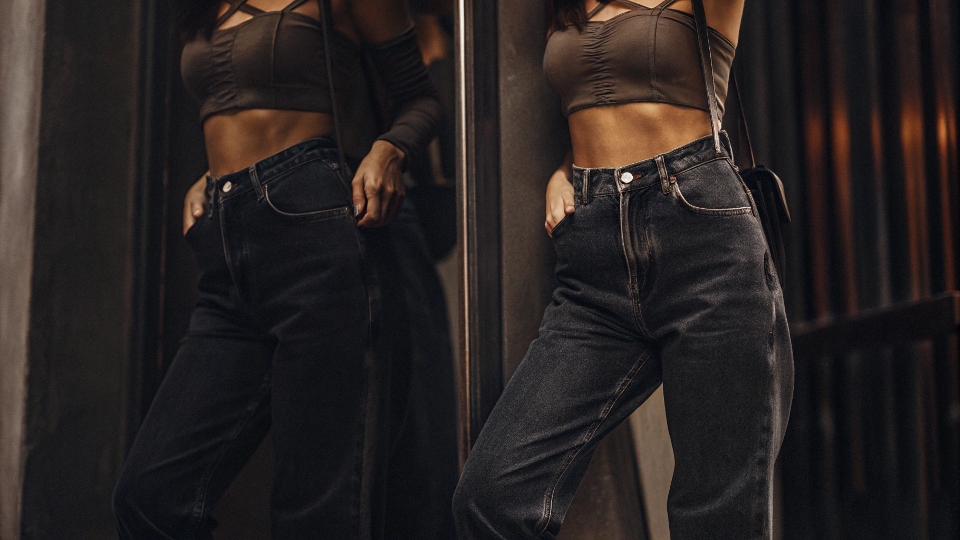 How to Style Baggy Jeans A stylish person looking chic and well-proportioned in baggy jeans