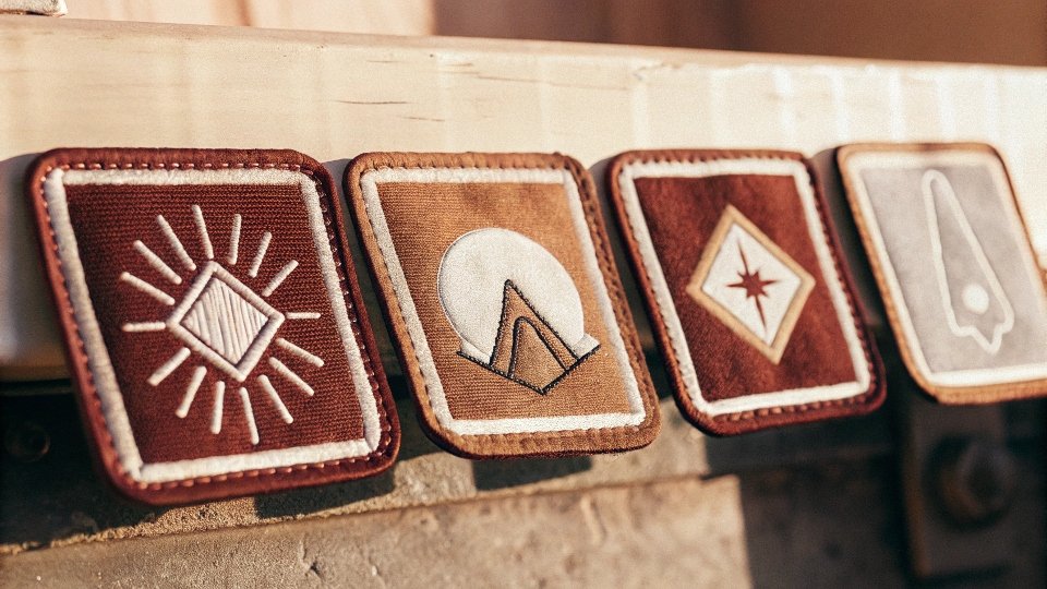 Best Types of Iron-On Patches for Jeans A collection of high-quality iron-on patches made from denim and canvas
