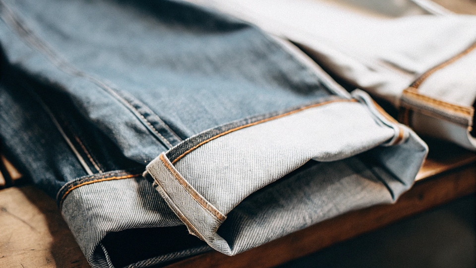 A close-up shot of the selvedge ID line on a pair of high-end Japanese jeans