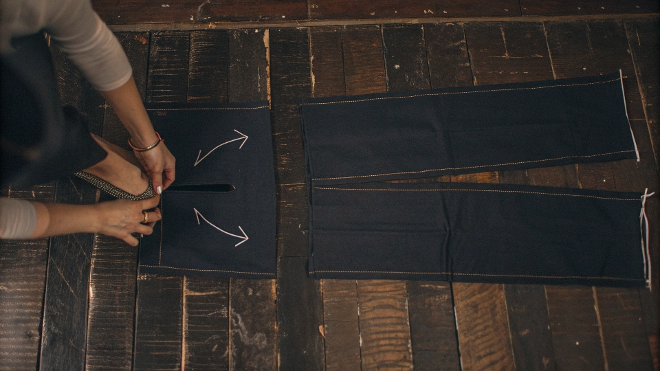 How to Cut Jeans for a Long Skirt A diagram showing where to cut jeans and open the inner seam to create a long skirt