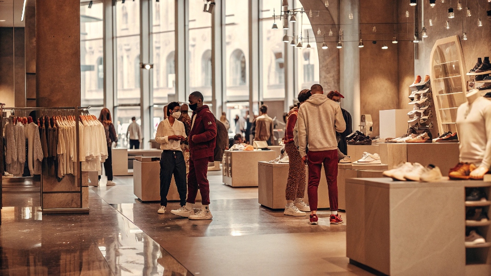 A modern, bustling [Puma flagship store](https://us.puma.com/us/en/help/faq/store-locator?srsltid=AfmBOoqwErTLbqG7xwXTXqHZ45FLDZlPTPyXXap2MFPo8dYUCzst08SA)[^6] in a major city like New York or London