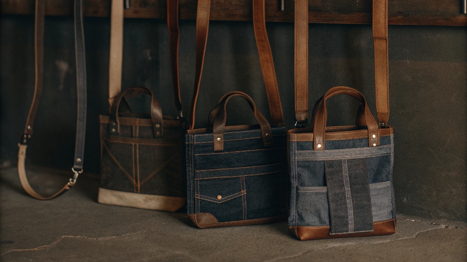 A collection of stylish handmade bags made from old blue jeans