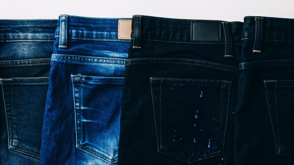 A collection of denim swatches showing various wash effects