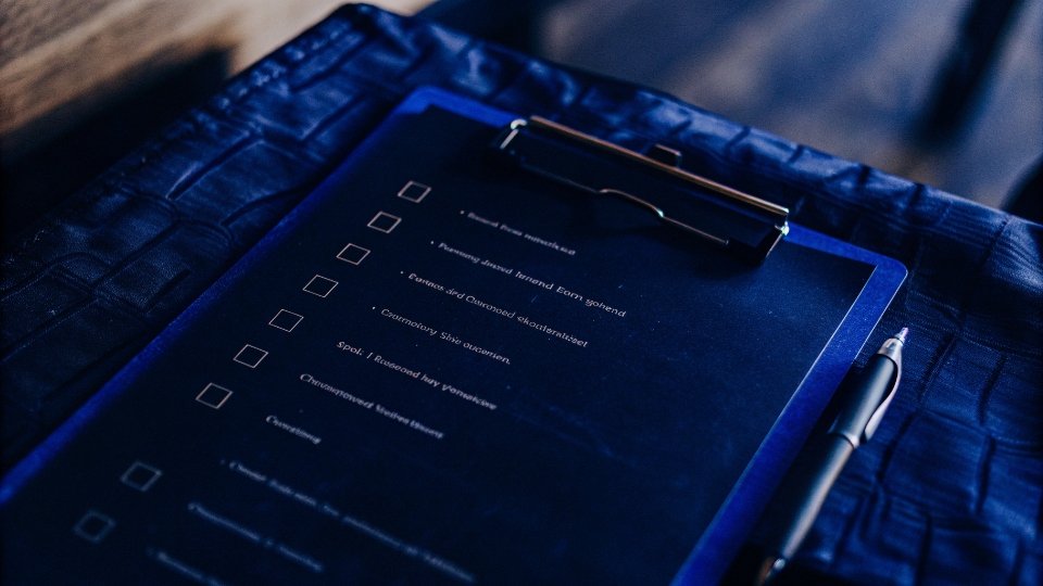 How to Vet a Clothing Manufacturer A checklist for vetting clothing manufacturers on a clipboard.