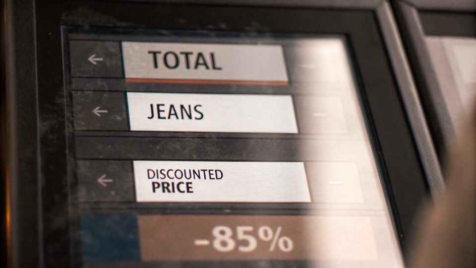 Calculating Discounts for Jean Bundles A calculator screen showing a calculation where multiple small quantities are added up to a large total, with a final discounted price highlighted.