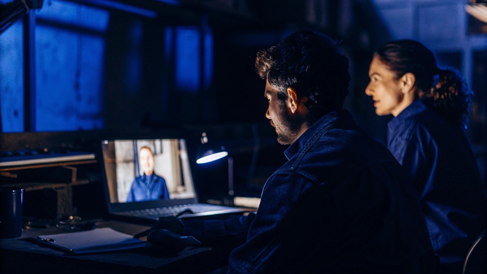 Assisting with Retailer Audit Questionnaires A factory compliance expert and a designer collaborating over a video call to complete an online audit form.