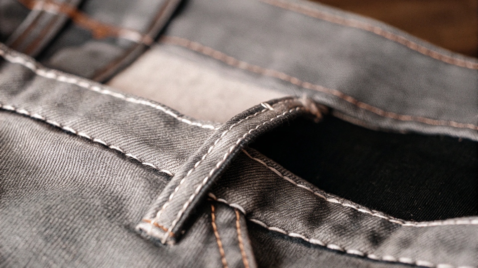 Bartack Reinforcement on Jeans Pockets A close-up view of a bartack stitch reinforcing the corner of a jeans pocket