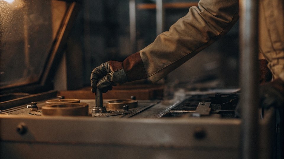Environmental Compliance Reports for Manufacturing A stack of official compliance reports and certificates with stamps and signatures
