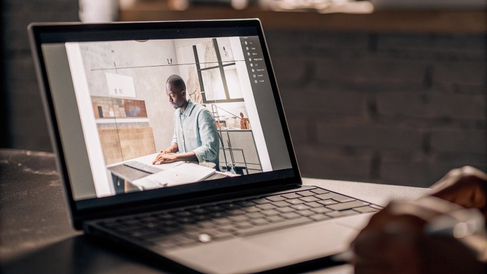 Guidelines for Clear Feedback in Remote Sessions A screen-sharing view on a video call, where a designer has circled an area on a digital flat sketch and is typing a note.