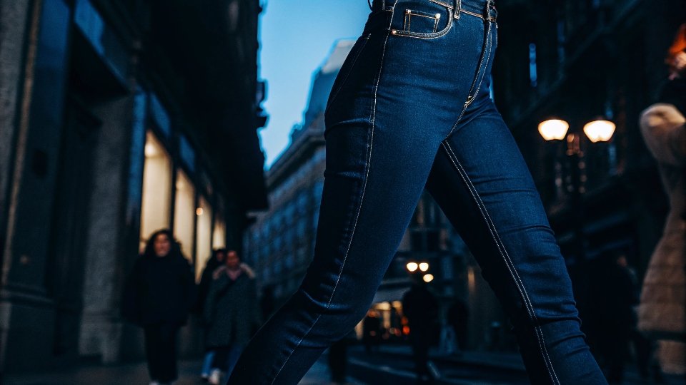 Is Investing in Jeans Worth It A collage of diverse people happily wearing different styles of niche denim brands.