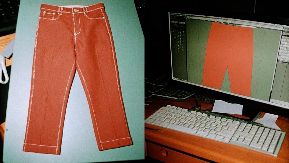 A computer screen showing a 3D digital rendering of a pair of jeans next to the 2D design file