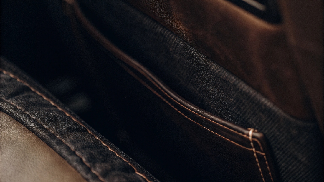 Denim Fabric Exterior vs. Interior A close-up shot of the textured, colored surface of denim fabric versus the smoother, lighter interior.
