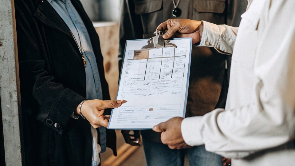 Signed and Dated Golden Sample Tag A picture of a sample tag that has been physically signed and dated by both the factory manager and the client's representative.