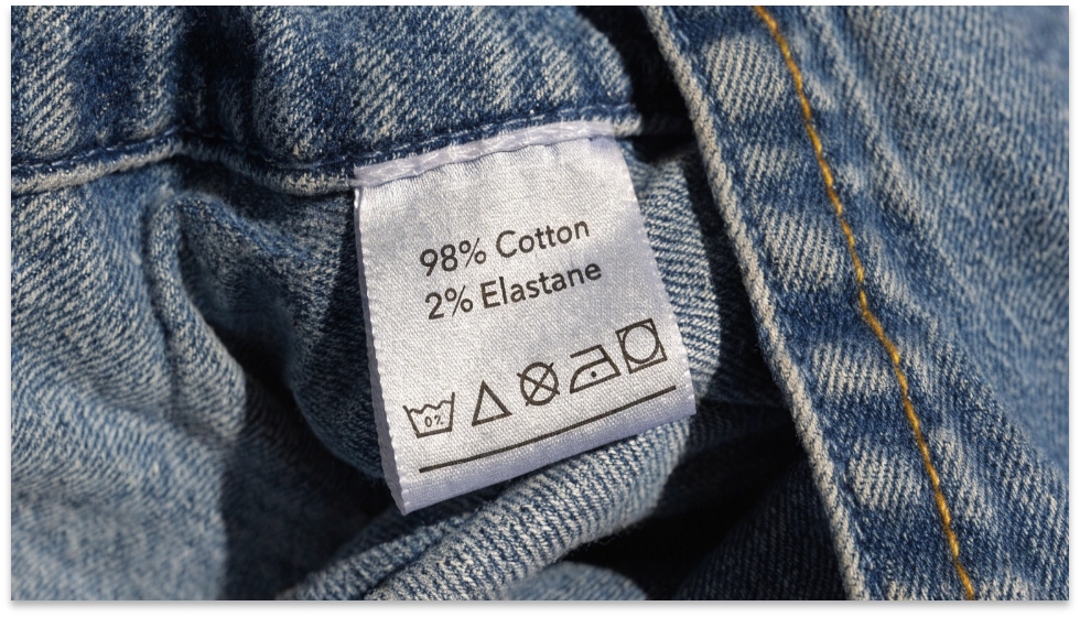 Denim Fabric Composition Tag A clothing tag that shows the fabric composition: 98% Cotton, 2% Elastane.