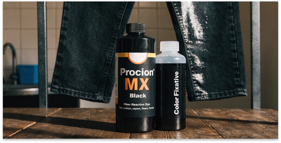 Permanent black dye for jeans A bottle of Procion MX black dye next to a color fixative bottle