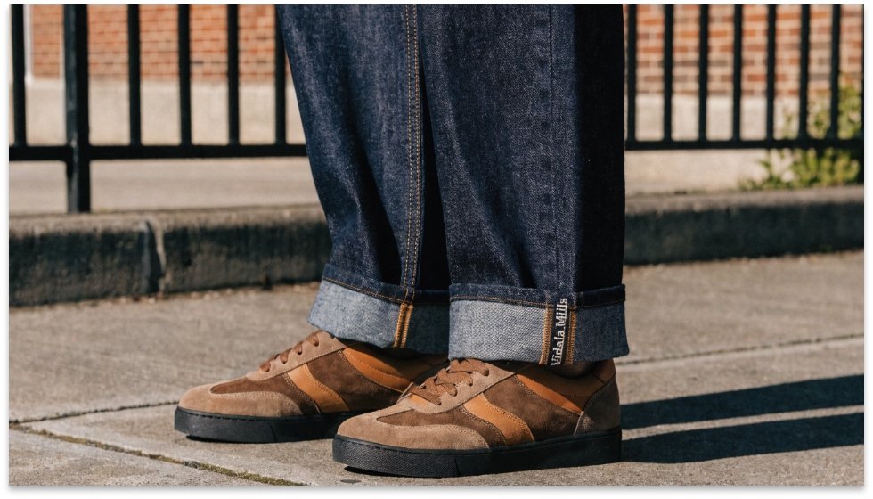 American selvedge denim detail A pair of American-made selvedge jeans with the cuff showing the selvedge ID line.